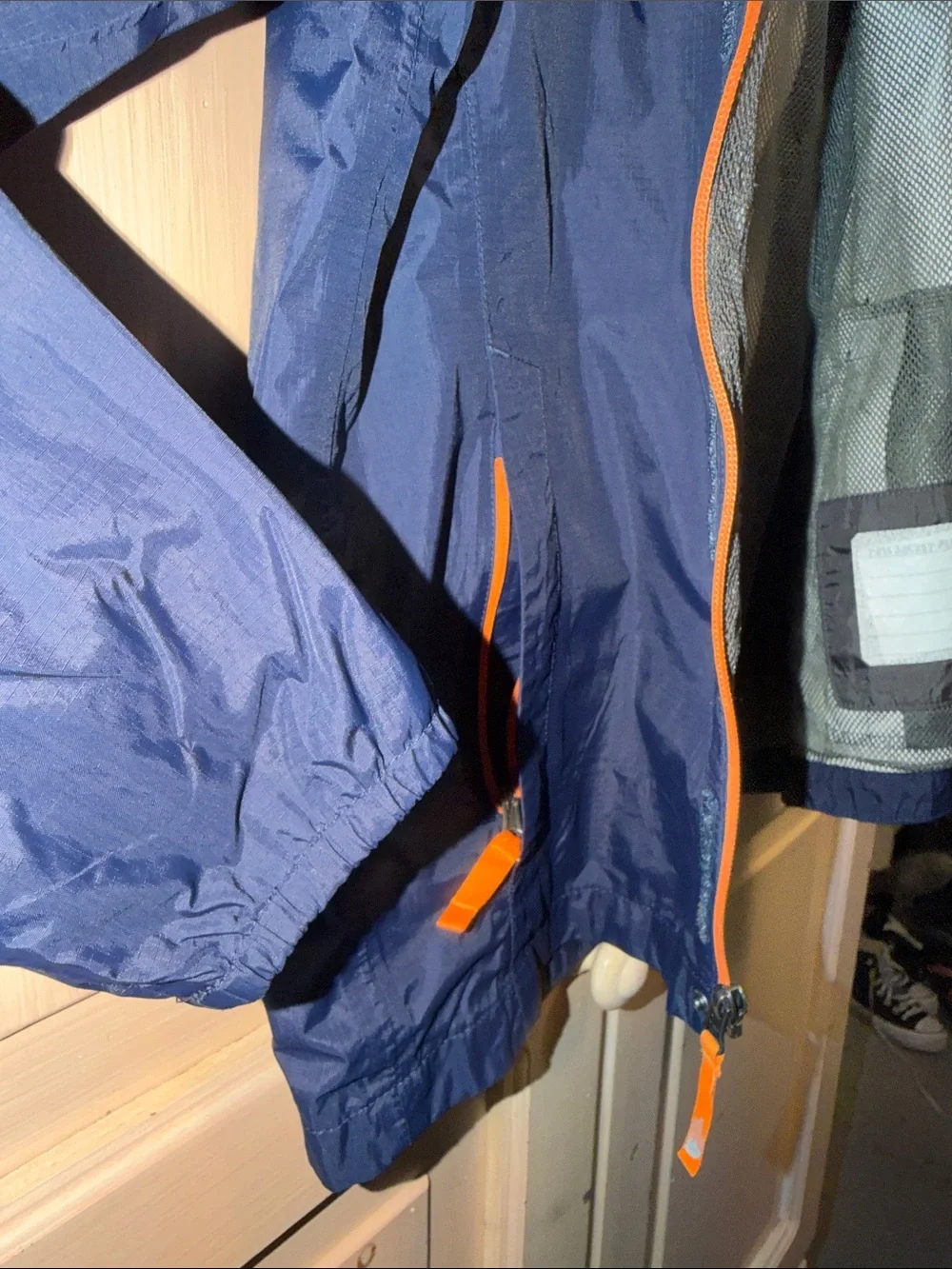 The North Face Kids Navy Blue and Orange Raincoat